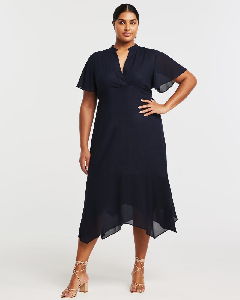 Front of a model wearing a size 16W Claudia Dress in Navy by Estelle. | dia_product_style_image_id:349787